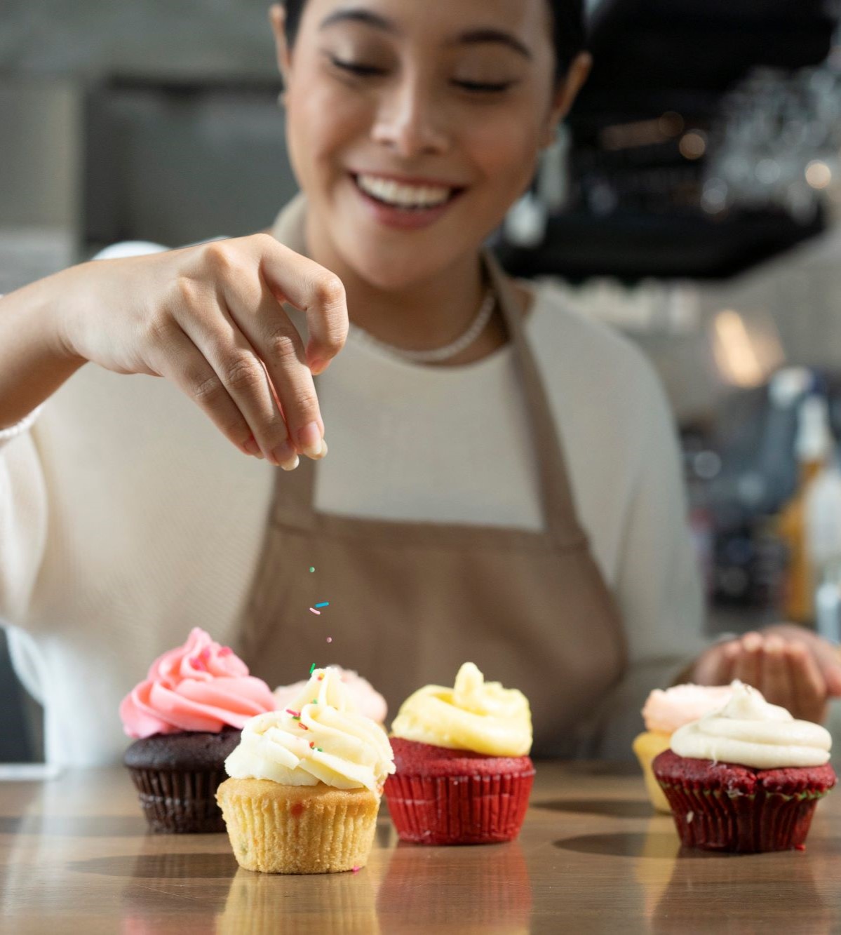 A woman baking a cupcake 1