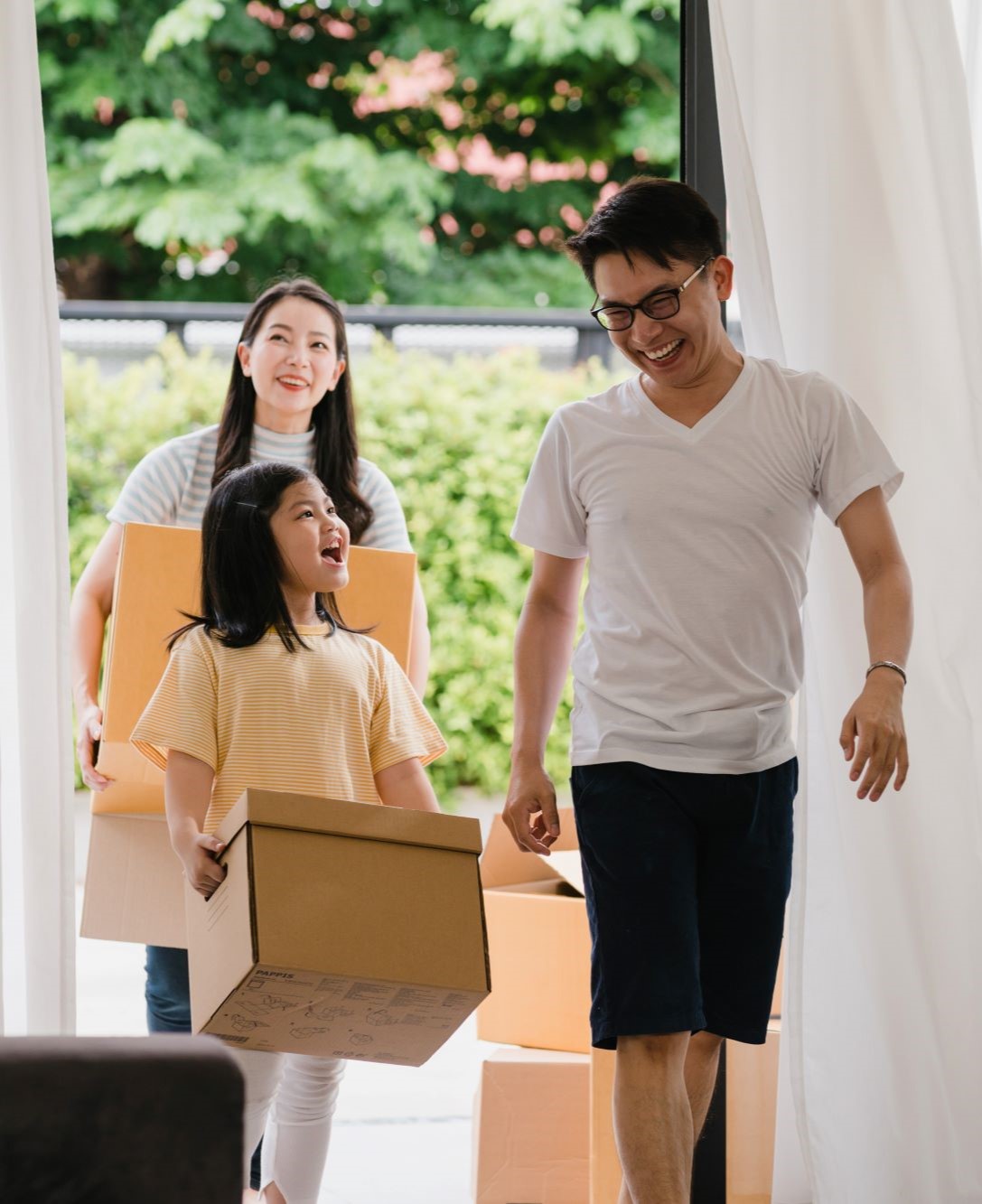 photo of a Asian family moving into their new home